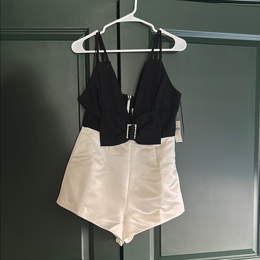 Maeve Black and Cream Jumpsuit with Bow Detail From Anthropologie